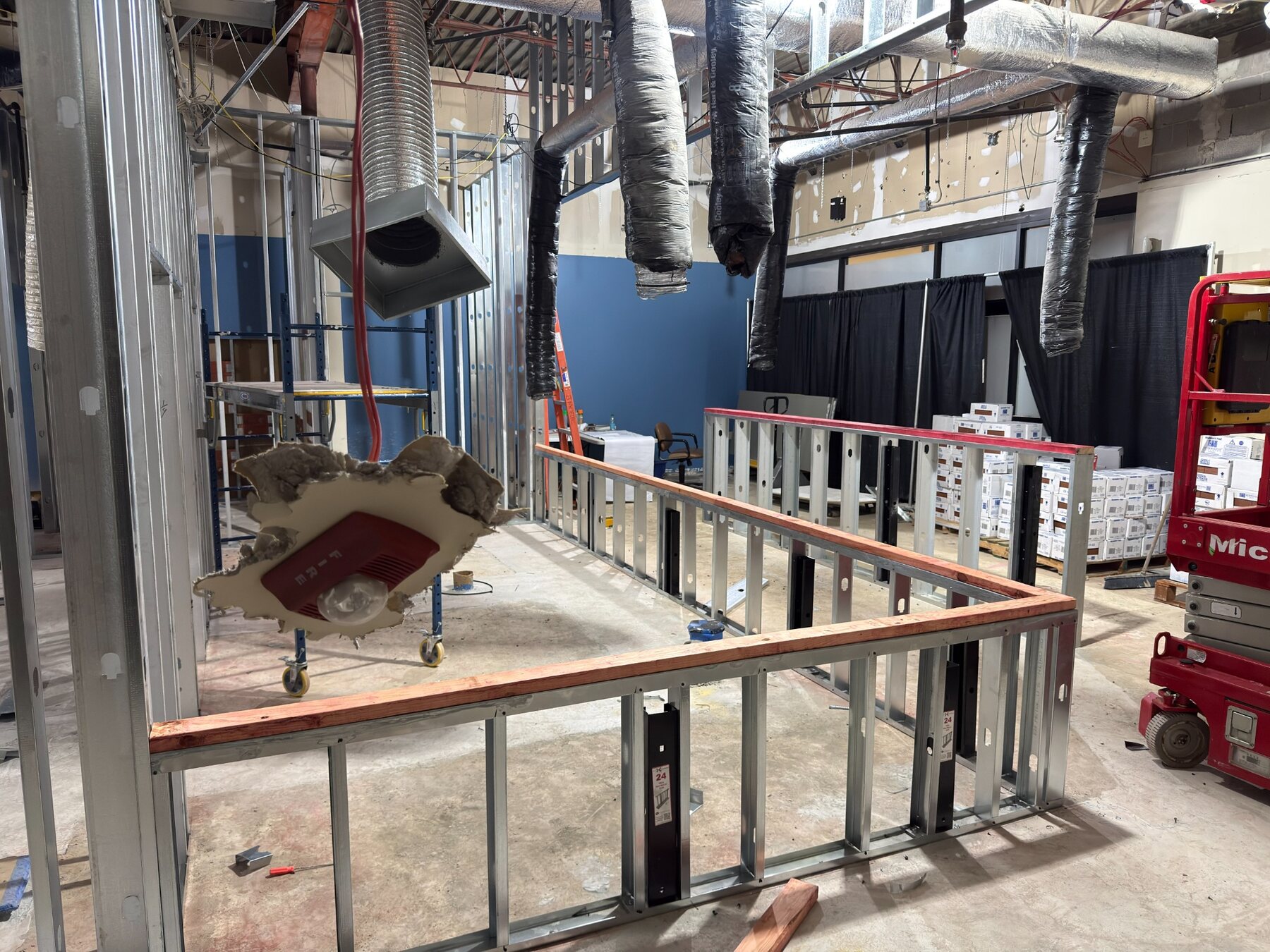 Front-of-house restaurant construction with new metal wall framing