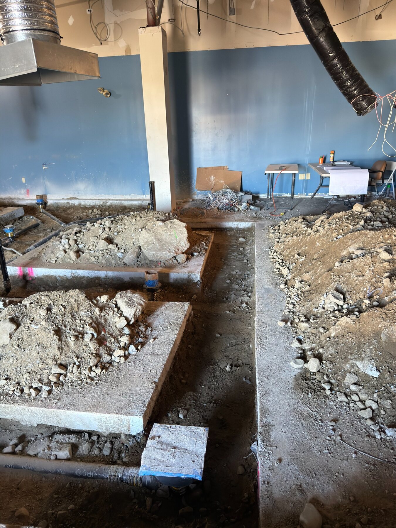 Alternate view of underground plumbing and electrical rough-in work
